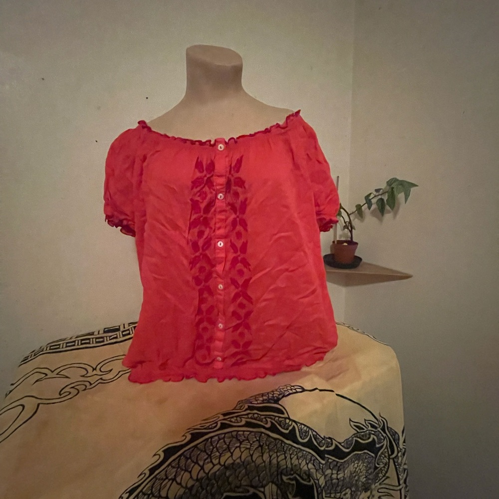 Embroidered orange shirt